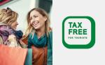 grafika z napisem Tax free for tourist. Obok zdjęcie dwóch uśmiechniętych kobiet, trzymających papierowe torby z zakupami.